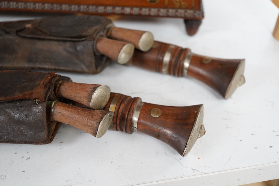 A Victorian brass inlaid rosewood workbox, together with two kukri knives, each 45cm in length